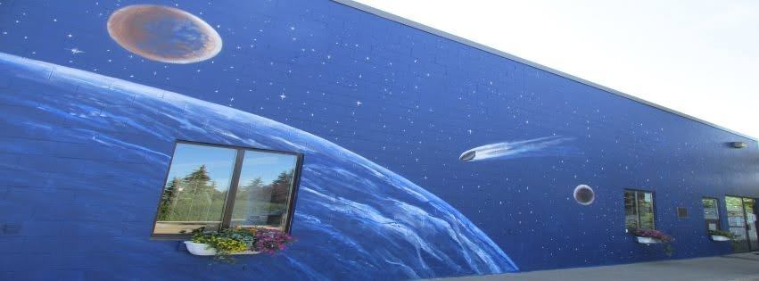 Space and meteorite mural painted on a building in Bruderheim, Alberta