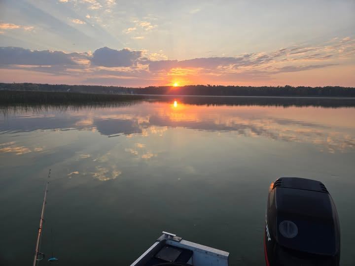 Fishing at sunset on Lac La Nonne, Alberta